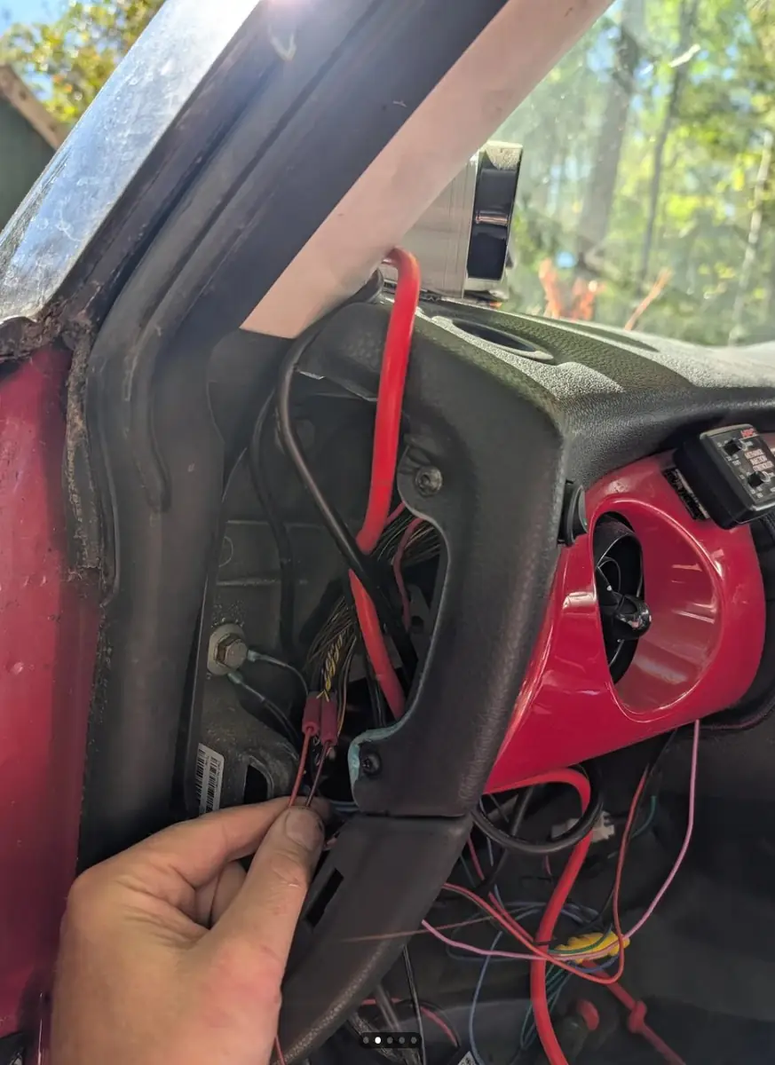 Running the wire up the A-pillar behind the trim, with the dash side panel off